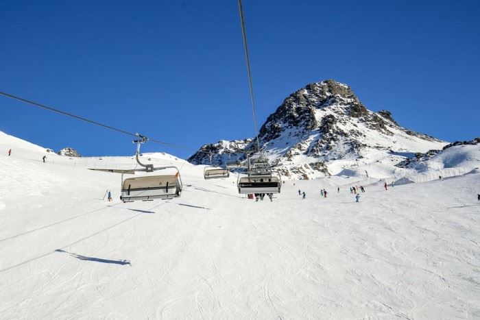 ski lifts on a snow-covered mountain
