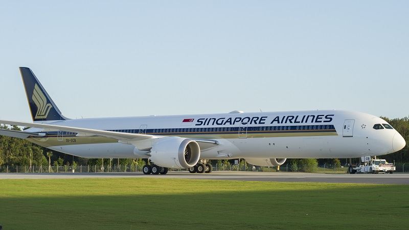 Singapore Airlines plane on runway offering free Wi-Fi