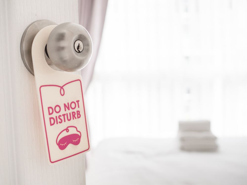 Hilton Updates ‘Do Not Disturb’ Policy, Requiring Alerts for Signs Up More Than 24 Hours
