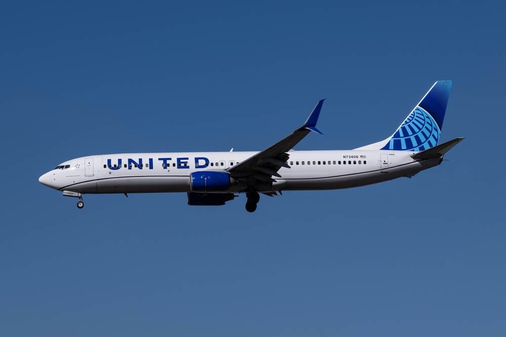 United Airlines plane in sky 