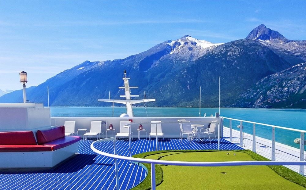 the sundeck on american constellation with alaska in the background