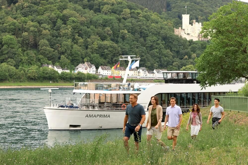 cruisers walking past amaprima river ship on the rhine river