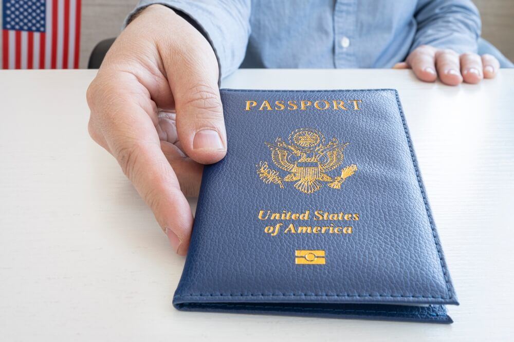 Man holding U.S. passport 