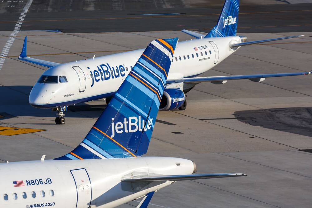 JetBlue planes on runway 