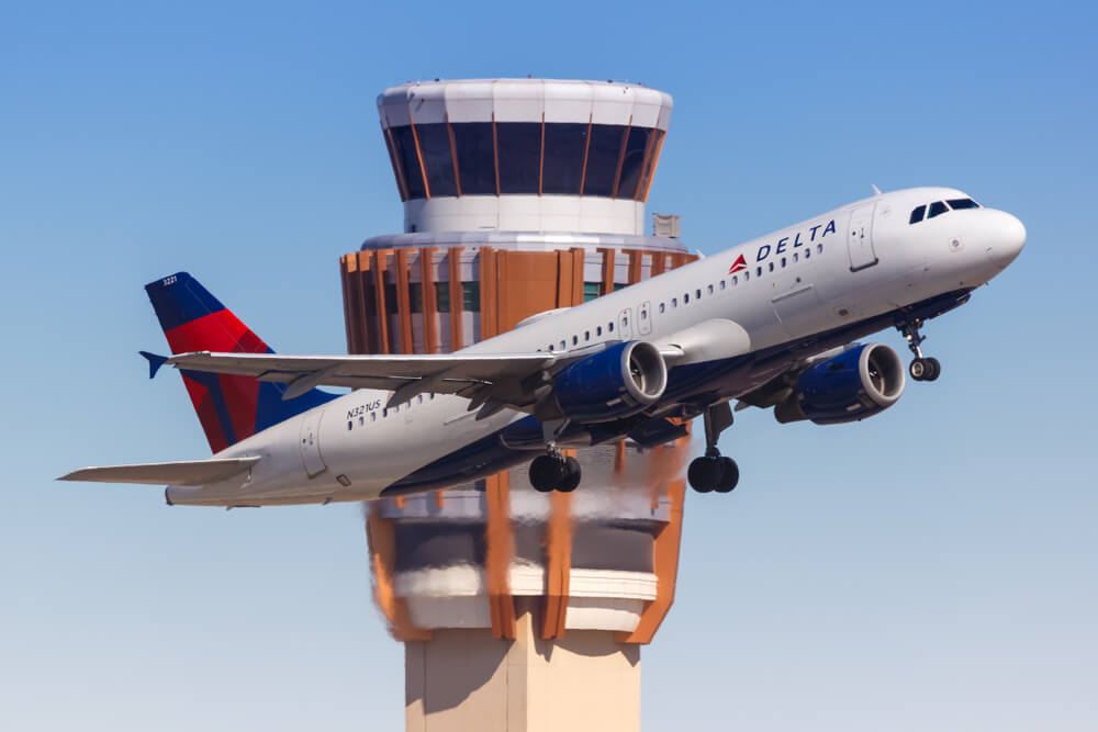 Delta Air Lines plane flying out of Phoenix airport 