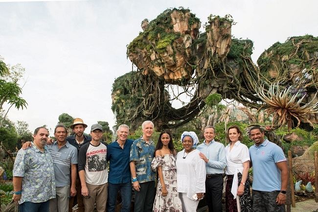 (L-R) Jon Landau, Wes Studi, Joel David Moore, Sam Worthington, Stephen Lang, James Cameron, Zoe Saldana, CCH Pounder, Bob Iger, Sigourney Weaver and Laz Alonso pose during the dedication of the new land, Pandora – The World of Avatar, at Disney’s Animal Kingdom on Wednesday