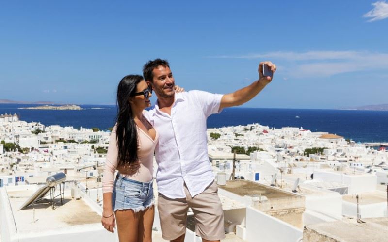 couple taking selfie in greece on a central holidays tour