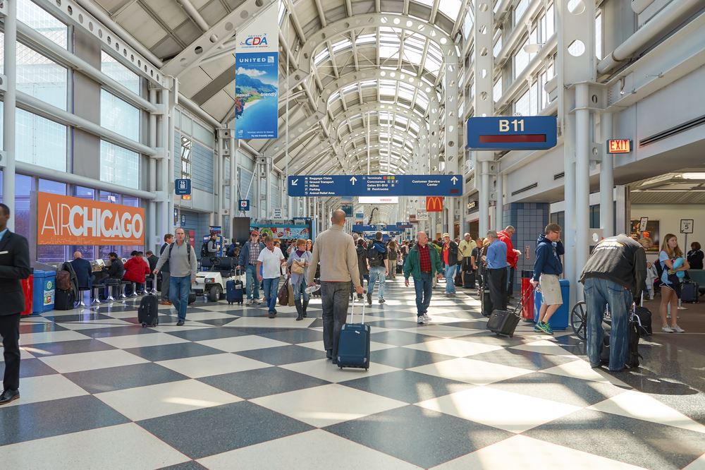 Thanksgiving travel days busy airport Chicago O'Hare. 