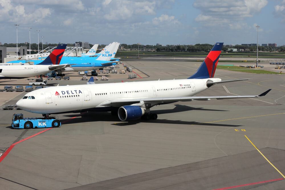 Delta Air Lines plane on runway in Amsterdam 