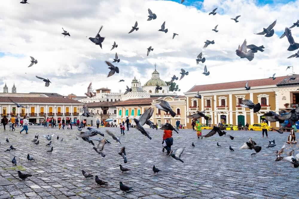 street view of san francisco square in quito old town, ecuador
