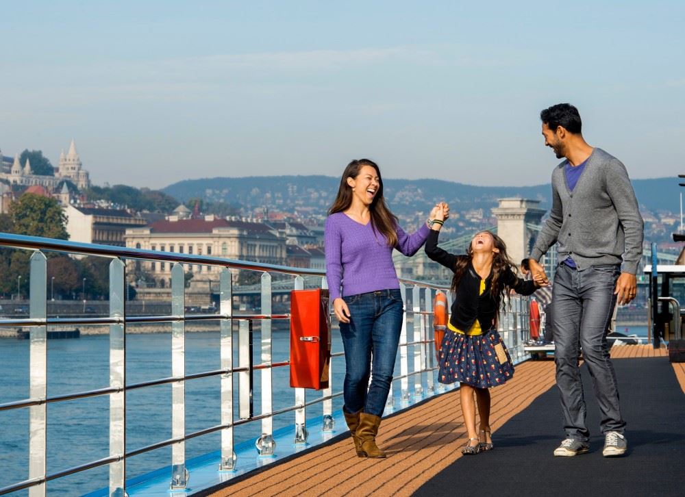 an asian family on an adventures by disney river cruise 