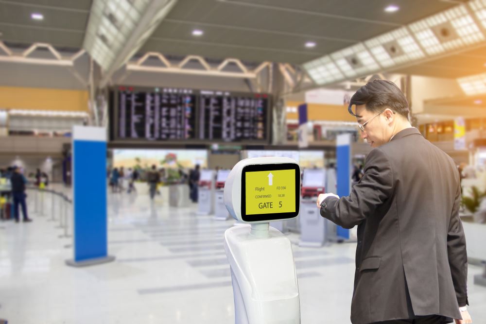 Artificial Intelligence being used as a man checks in at airport 