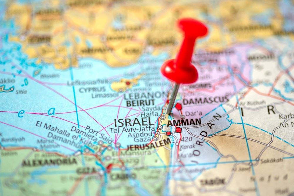 map of middle east with pin in israel