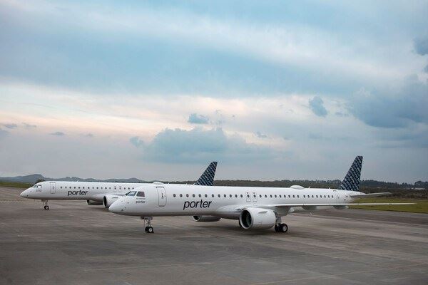 Two Porter Airlines planes on runway for Florida flights 