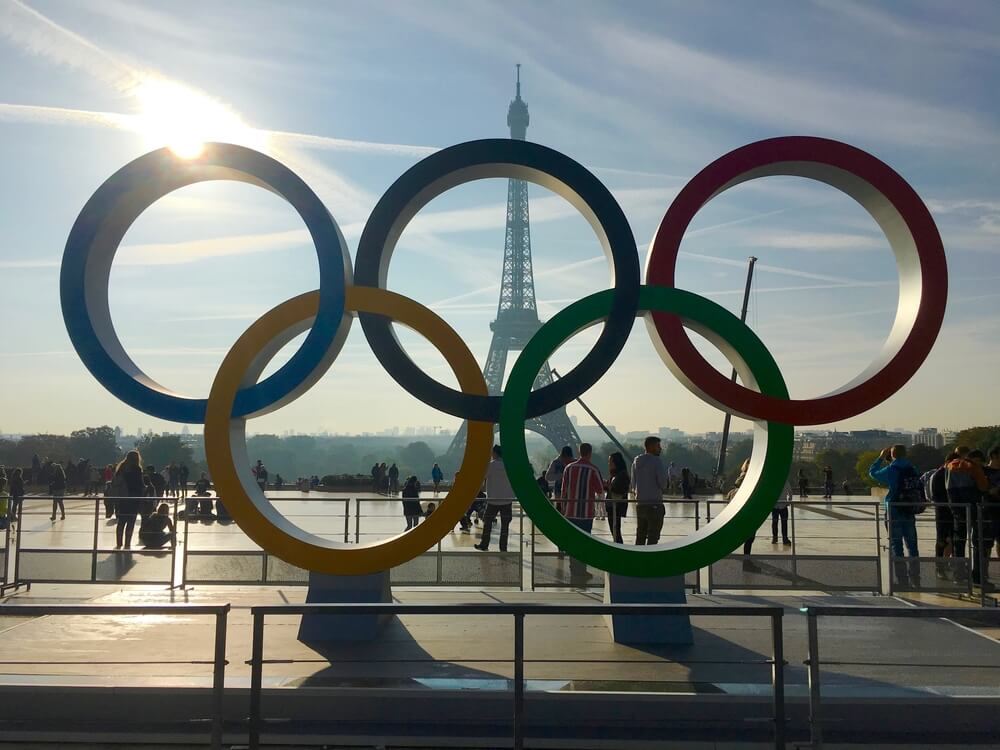 Paris Olympics Rings in front of Eiffel Tower 