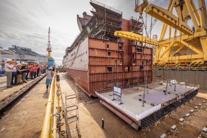 queen anne's keel section being put in place at shipyard