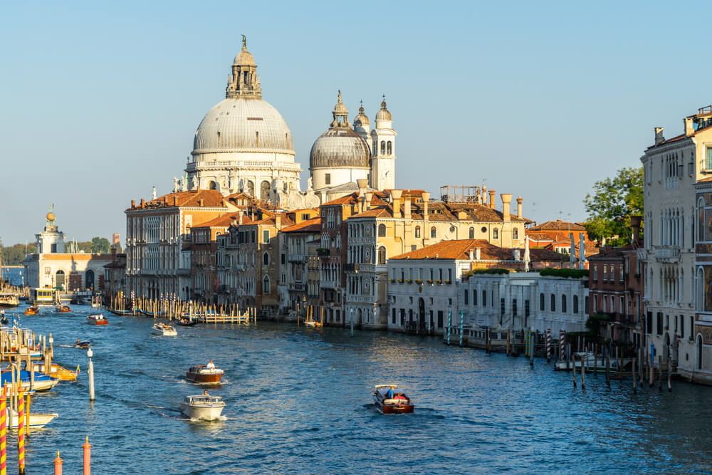Venetian cityscape at sunset, with a view on the Grand Canal and the domes of Santa Maria della Salute