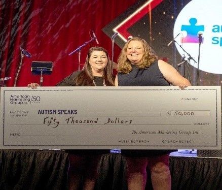 American Marketing Group Raises $50,000 for Autism Speaks
