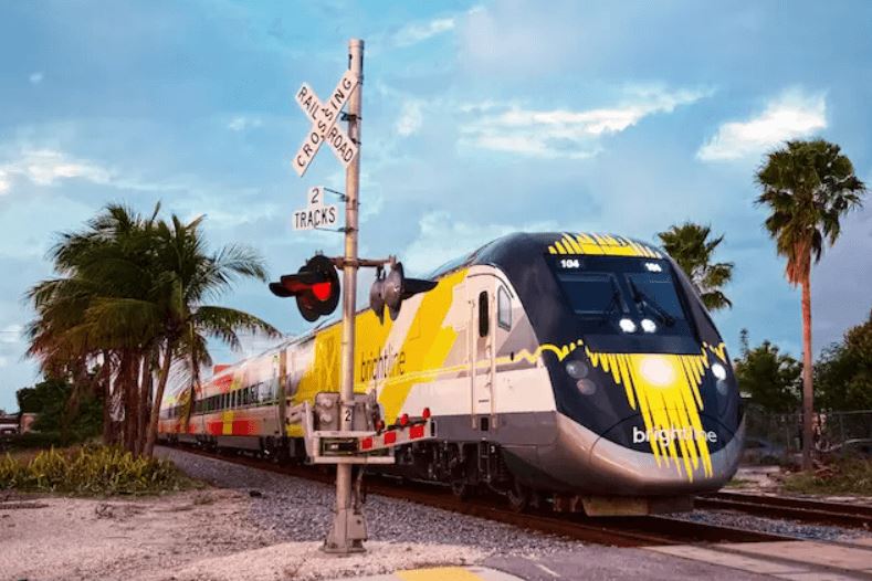 the bright yellow brightline train