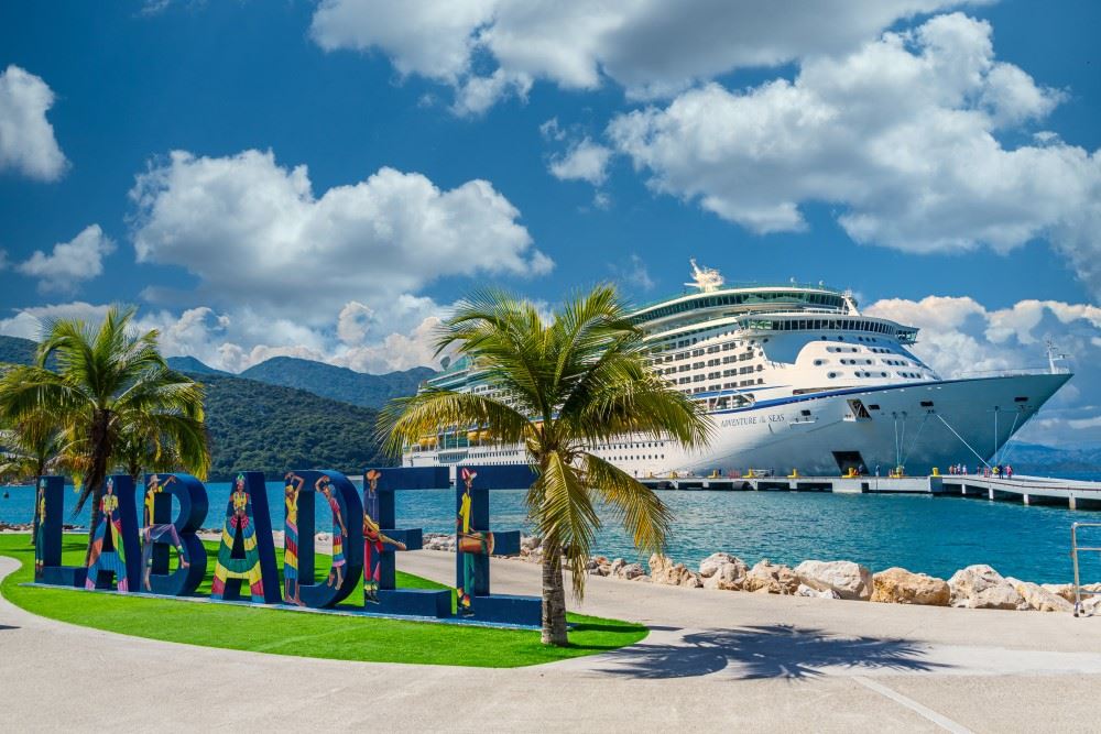 a royal caribbean ship docked at the port of labadee