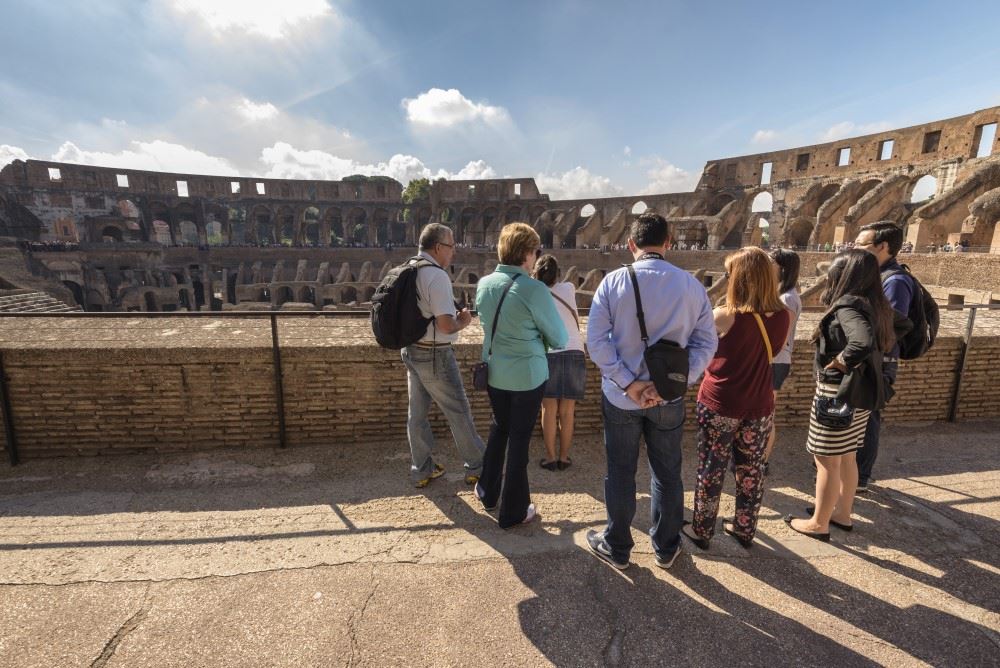 tour group at the colosseum in rome